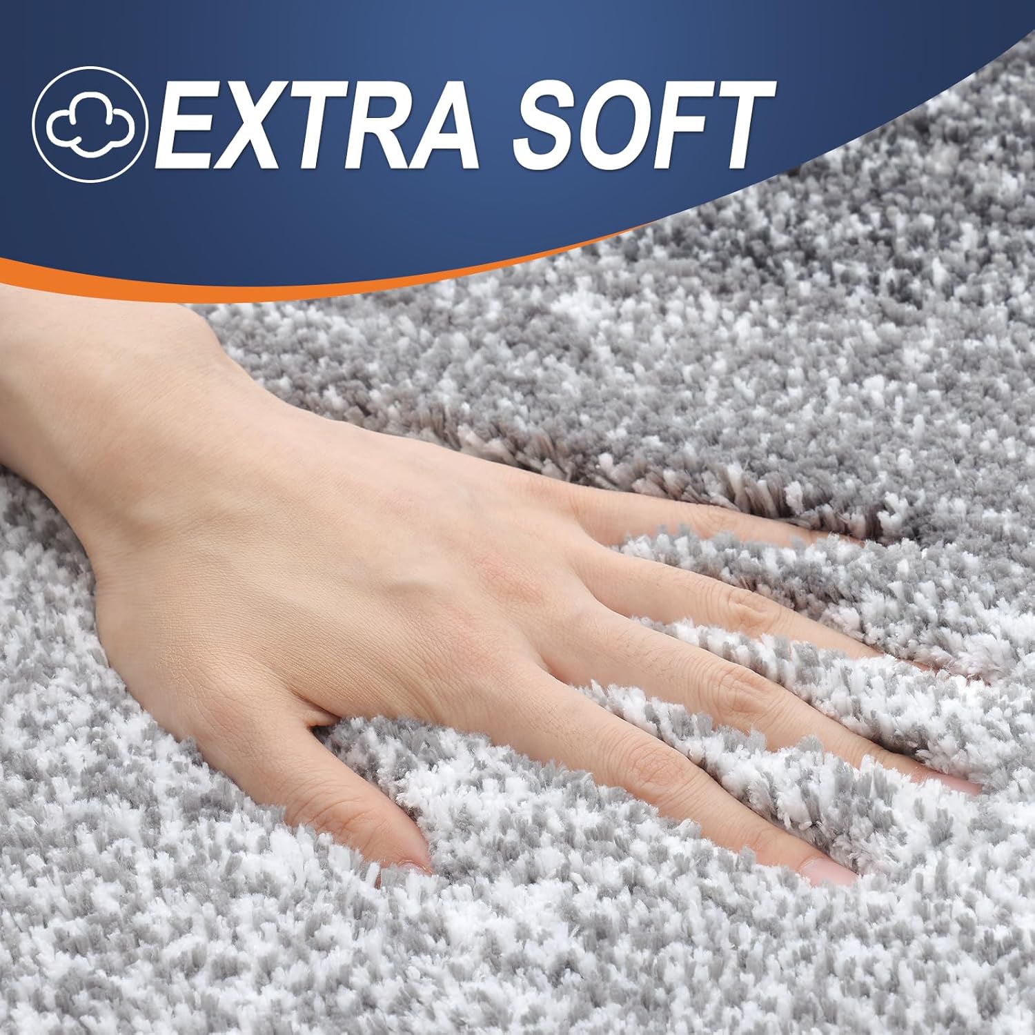 Close-up of microfiber bath rug showing ultra-fine synthetic fibers with hand touching the extra-soft surface texture